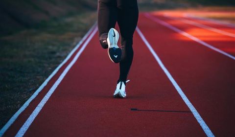 A runner wearing Nike running shoes.