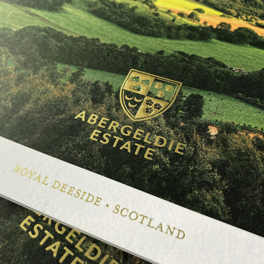 Marketing material for Abergeldie Estate on premium stock.